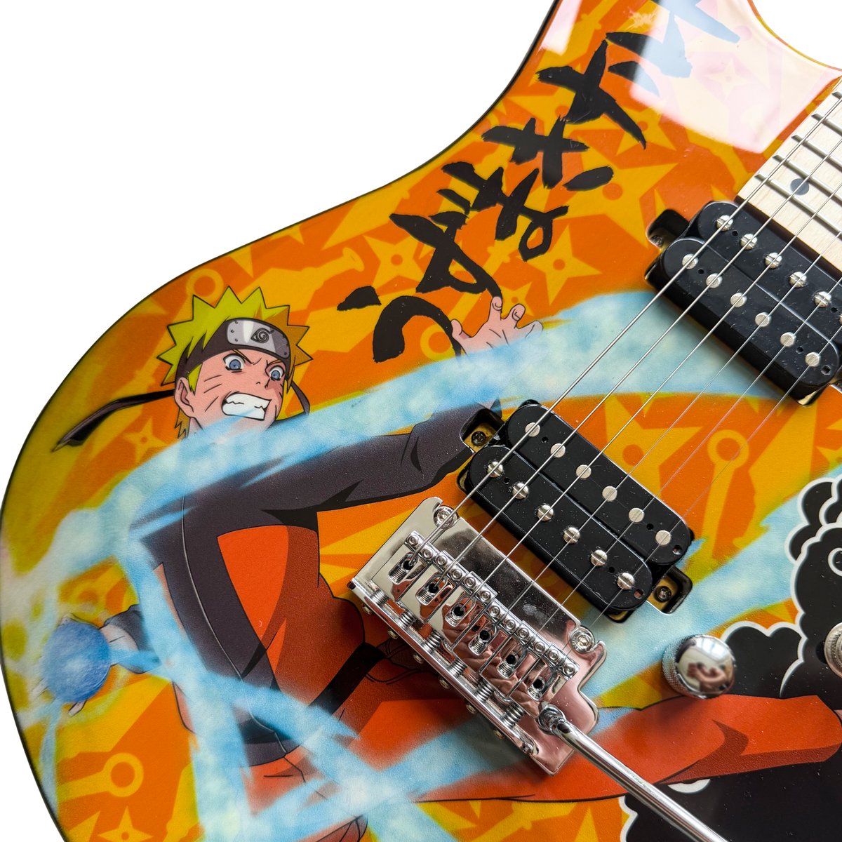 Close-up of the official artwork on the orange Rasengan guitar body, showing Naruto with his Rasengan, the double-coil pickups and the twin pivot vibrato bridge